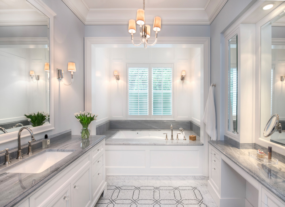 Bathroom - large transitional master mosaic tile floor and multicolored floor bathroom idea with shaker cabinets, white cabinets, an undermount tub, gray walls and an undermount sink