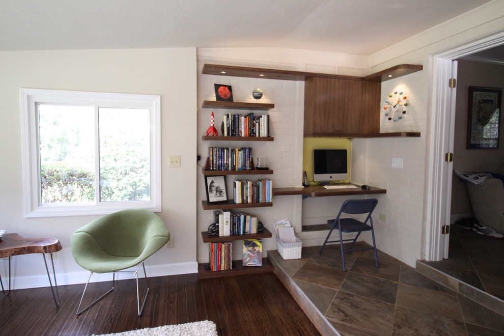 Inspiration for a mid-sized midcentury enclosed living room in Other with white walls and dark hardwood floors.