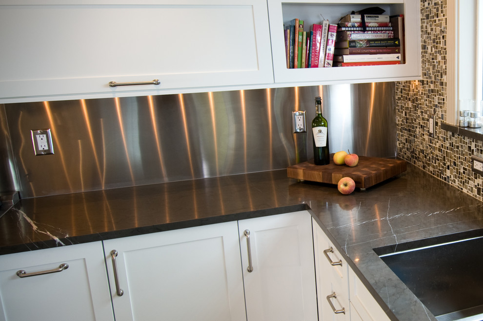 Example of a transitional kitchen design in Denver
