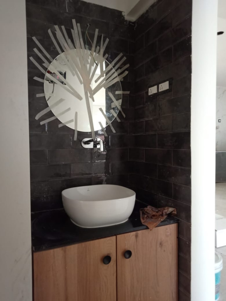 Height of the wall mounted faucet from the top of basin