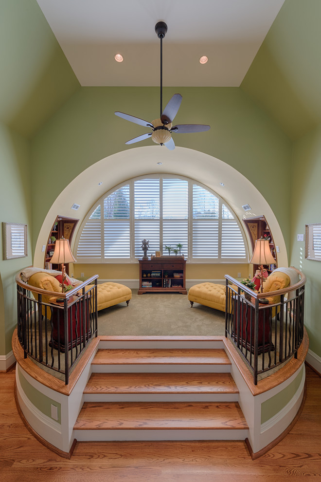 This is an example of an eclectic family room in Charlotte.