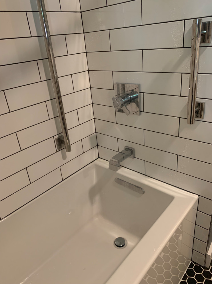 This is an example of a midcentury bathroom in Manchester.