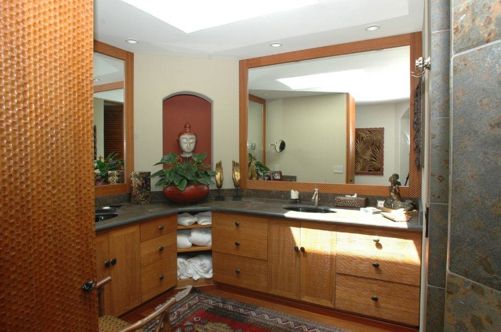 Large asian master bathroom in San Diego with flat-panel cabinets, medium wood cabinets, gray tile, stone tile, beige walls, dark hardwood floors, an undermount sink, concrete benchtops, a hot tub, a one-piece toilet, brown floor and an open shower.