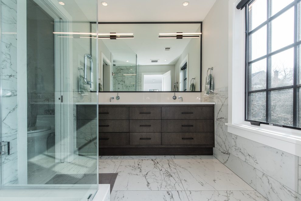 Mid-sized transitional master bathroom in DC Metro with flat-panel cabinets, brown cabinets, an alcove shower, a one-piece toilet, gray tile, marble, white walls, marble floors, an undermount sink, engineered quartz benchtops, grey floor, a hinged shower door and white benchtops.