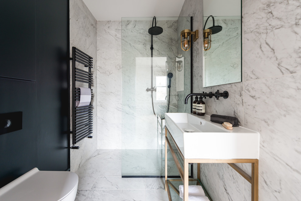 Inspiration for a small contemporary 3/4 bathroom in London with flat-panel cabinets, blue cabinets, an open shower, a one-piece toilet, black and white tile, marble, grey walls, marble floors, a console sink, grey floor and an open shower.
