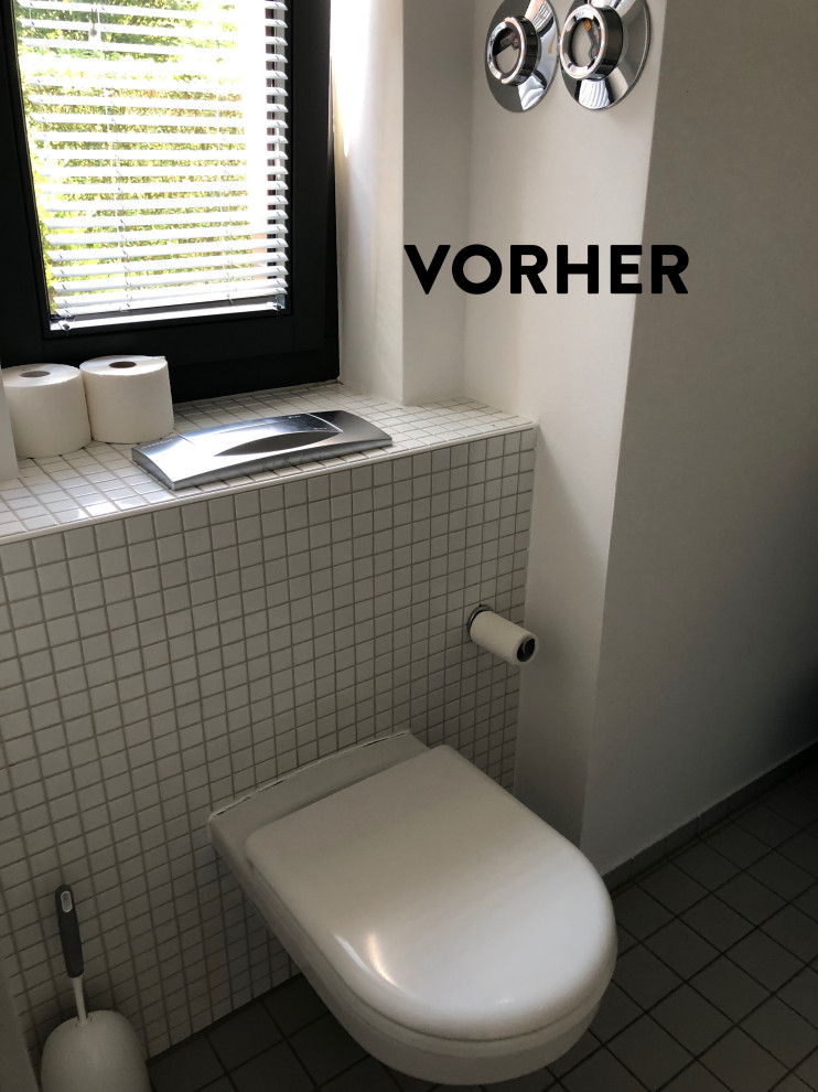Example of a small minimalist powder room design in Dortmund