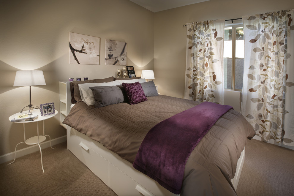 Contemporary bedroom in Orange County with beige walls.