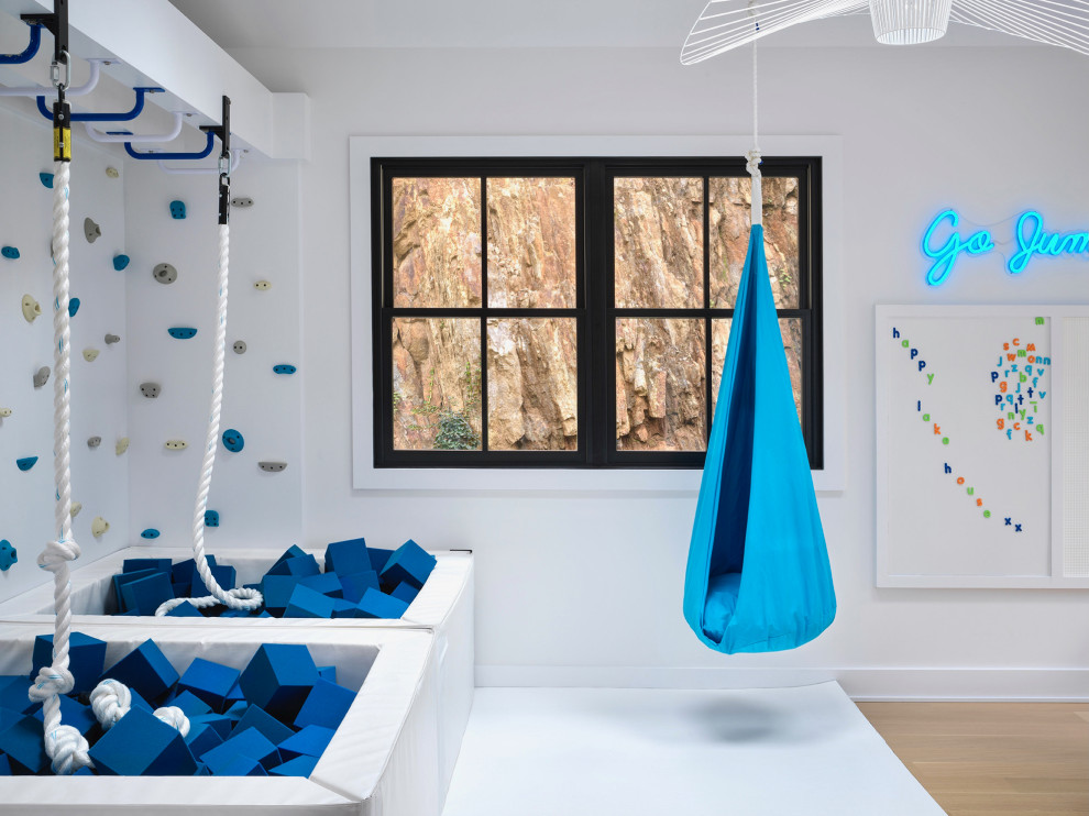 This is an example of a beach style kids' room in New York.