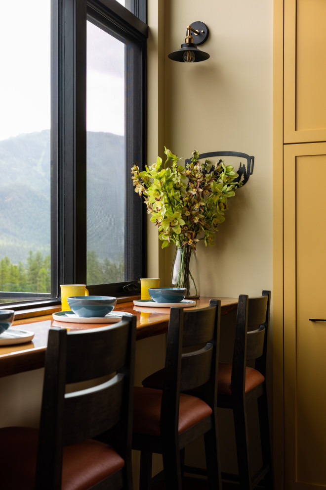 Example of a mountain style kitchen design in Vancouver