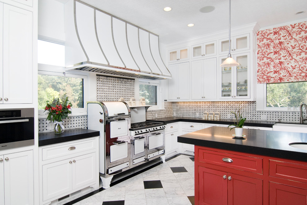 Design ideas for a country kitchen in San Francisco with beaded inset cabinets, red cabinets and white appliances.
