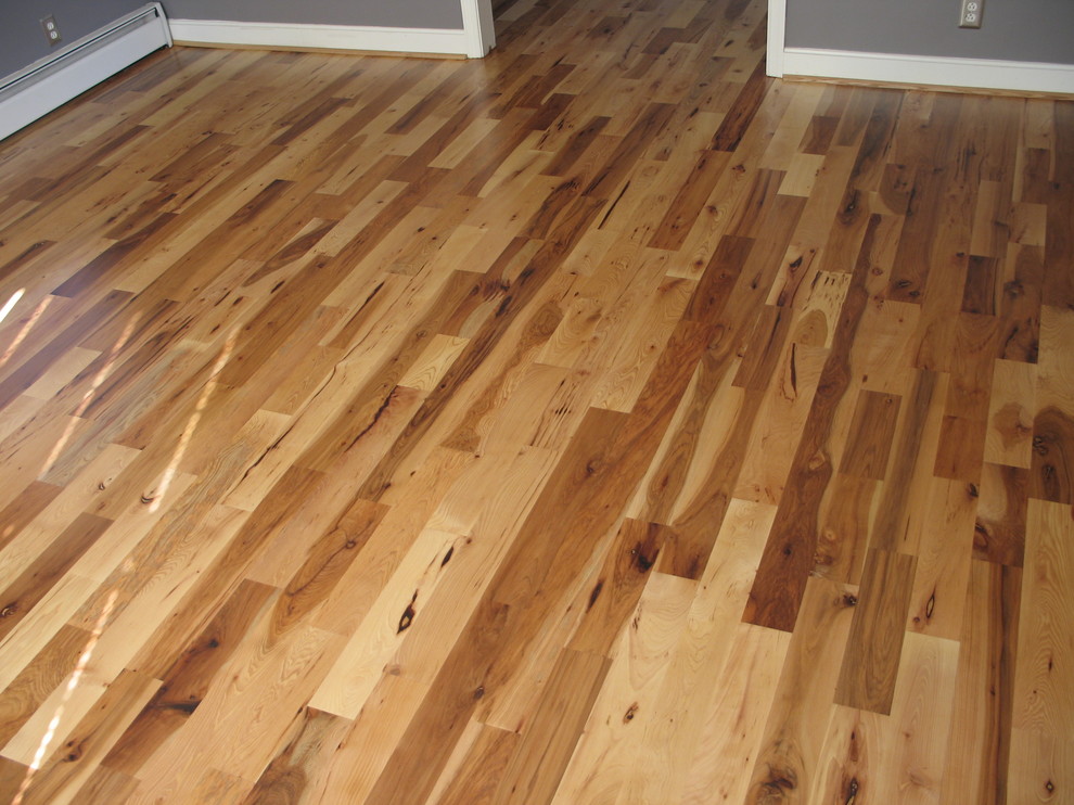 Inspiration for a rustic light wood floor home design remodel with no fireplace and purple walls