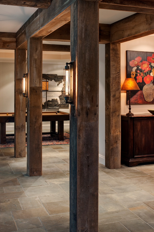 Inspiration for a large country basement in Richmond with beige walls, slate floors, no fireplace and beige floor.