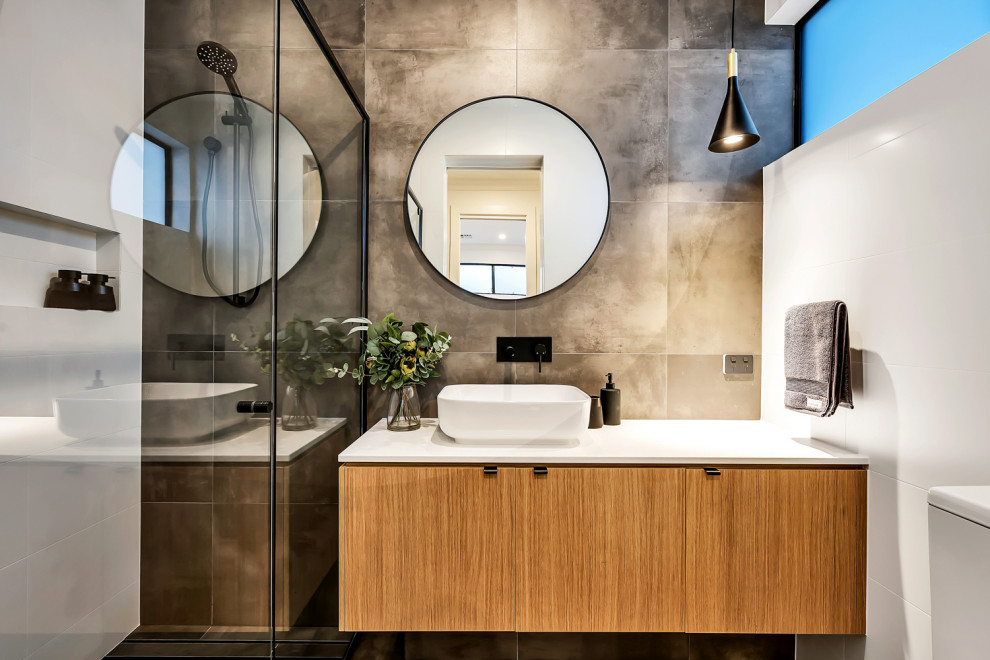Example of a mid-sized urban 3/4 gray tile single-sink bathroom design in Adelaide with furniture-like cabinets, white cabinets, white countertops and a built-in vanity