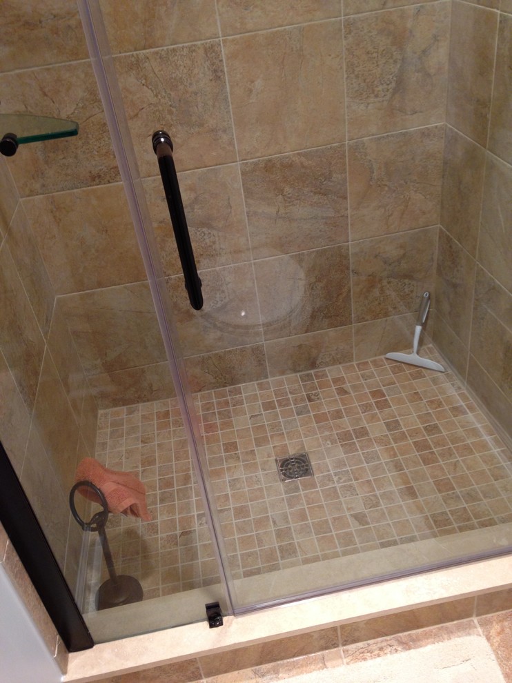 Large transitional master multicolored tile and porcelain tile porcelain tile alcove bathtub photo in Baltimore with an integrated sink, raised-panel cabinets, white cabinets, solid surface countertops, a two-piece toilet and blue walls
