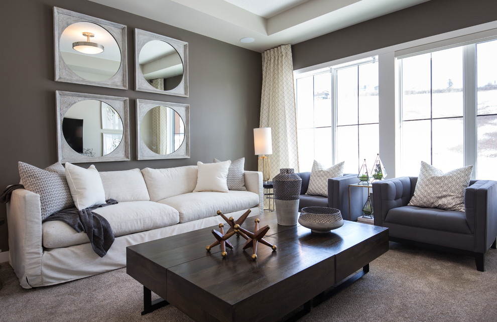 Photo of a mid-sized transitional loft-style family room in Calgary with a game room, grey walls, carpet, a freestanding tv and beige floor.