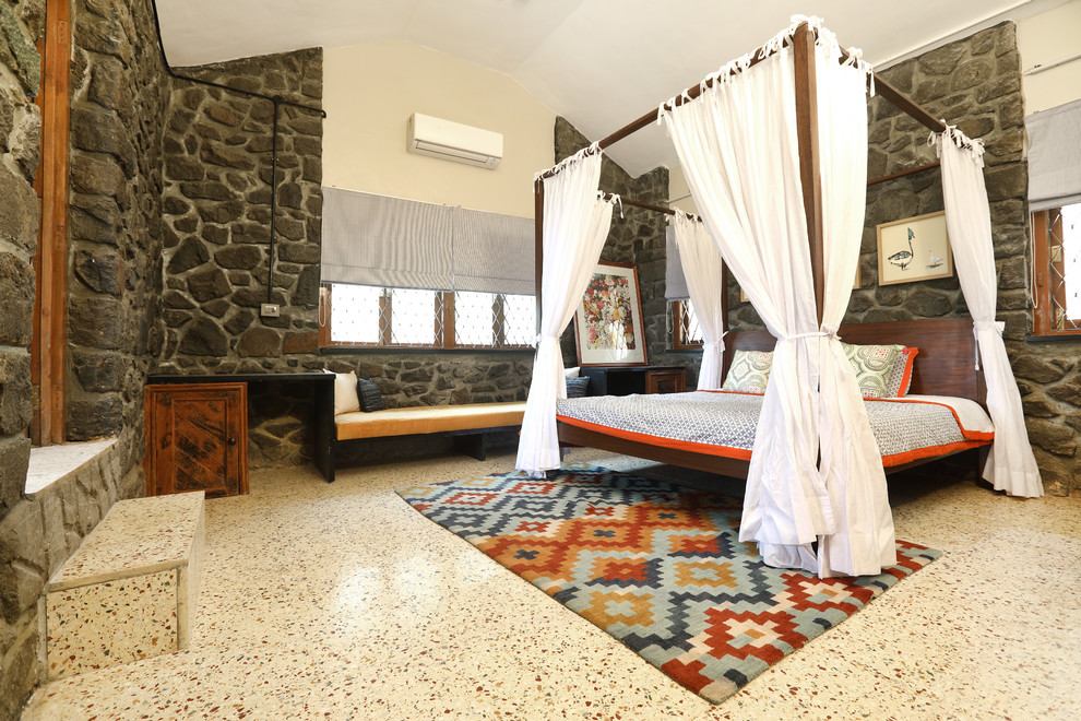 This is an example of a transitional bedroom in Mumbai.