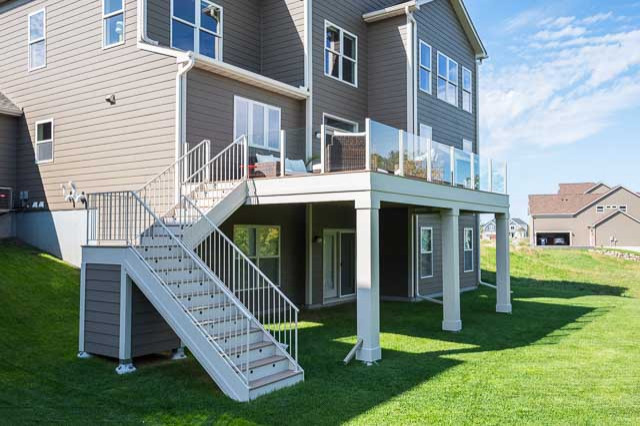 Mid-sized minimalist metal railing deck photo in Minneapolis
