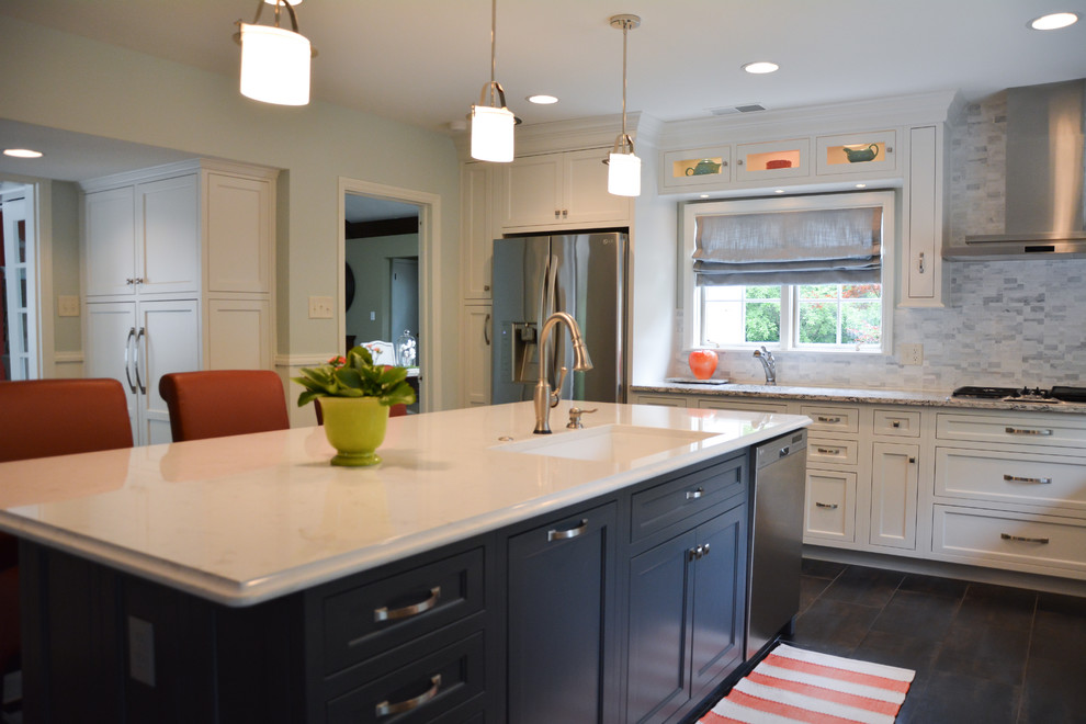 Mid-sized transitional l-shaped eat-in kitchen in Indianapolis with a single-bowl sink, raised-panel cabinets, white cabinets, soapstone benchtops, grey splashback, matchstick tile splashback, stainless steel appliances, dark hardwood floors and no island.