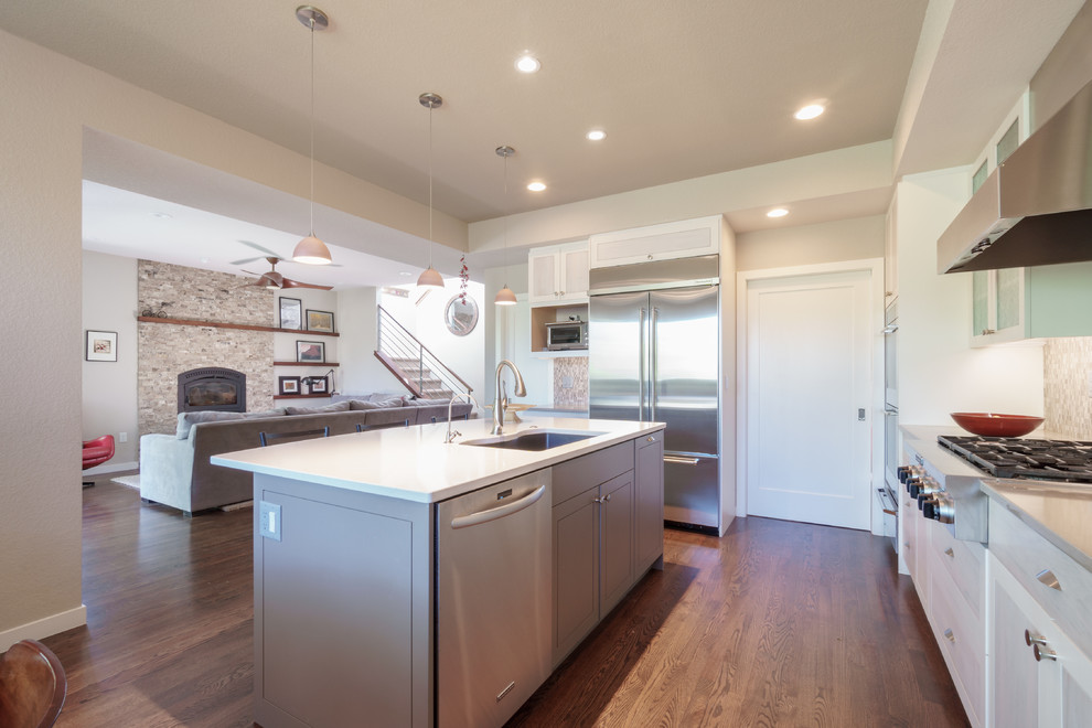 Example of a transitional kitchen design in Denver
