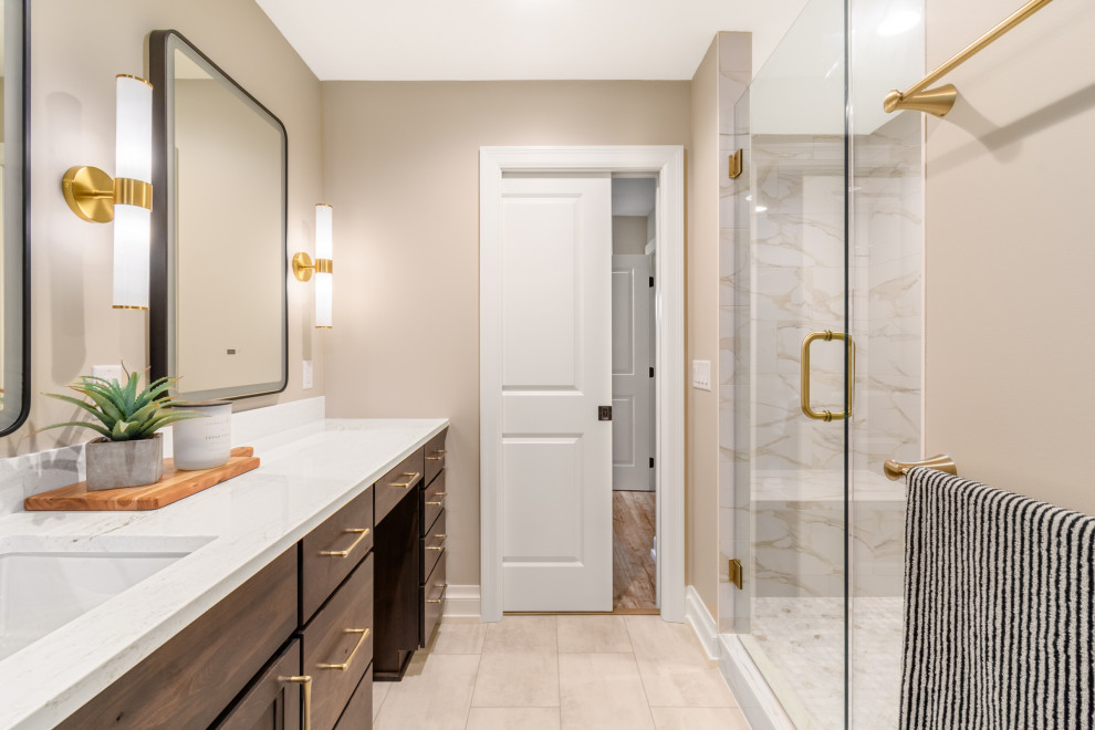 Transitional porcelain tile and beige floor bathroom photo in Minneapolis with recessed-panel cabinets, dark wood cabinets and beige walls