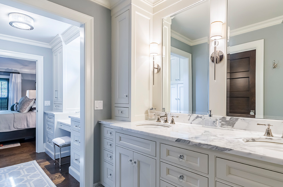 Inspiration for a large traditional master bathroom in Chicago with beaded inset cabinets, white cabinets, a drop-in tub, grey walls, dark hardwood floors, an undermount sink, engineered quartz benchtops and brown floor.