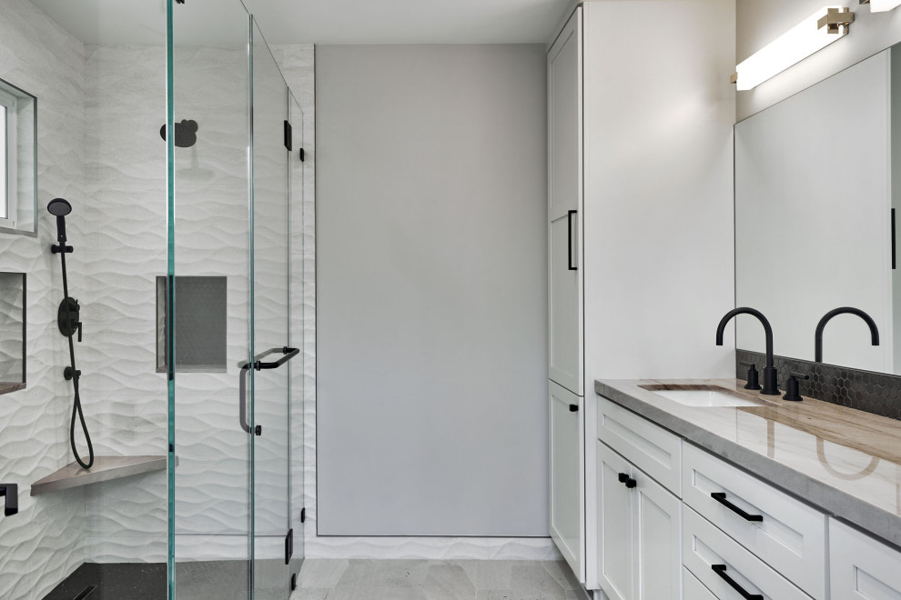 Inspiration for a mid-sized modern master bathroom in San Francisco with flat-panel cabinets, white cabinets, a curbless shower, a one-piece toilet, beige tile, porcelain tile, grey walls, porcelain floors, an undermount sink, quartzite benchtops, beige floor, a hinged shower door and beige benchtops.