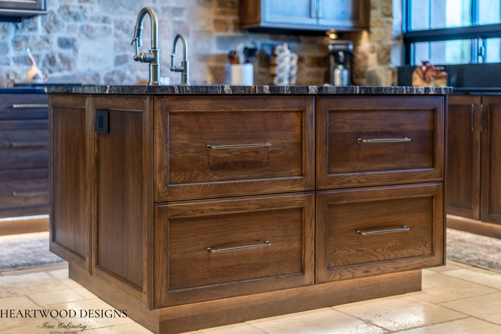 Inspiration for a transitional kitchen remodel with shaker cabinets, dark wood cabinets, paneled appliances and an island