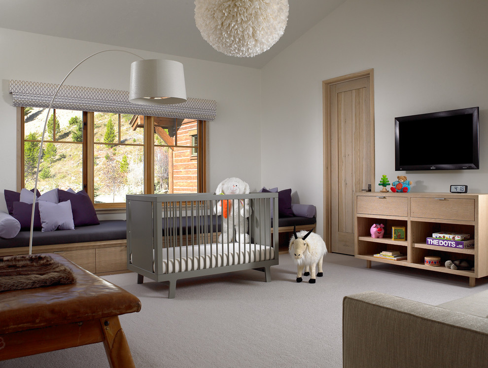 Design ideas for a mid-sized country gender-neutral nursery in Other with white walls, carpet and grey floor.