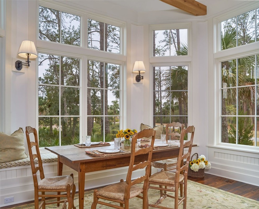 Design ideas for a mid-sized traditional separate dining room in Atlanta with white walls, no fireplace and dark hardwood floors.