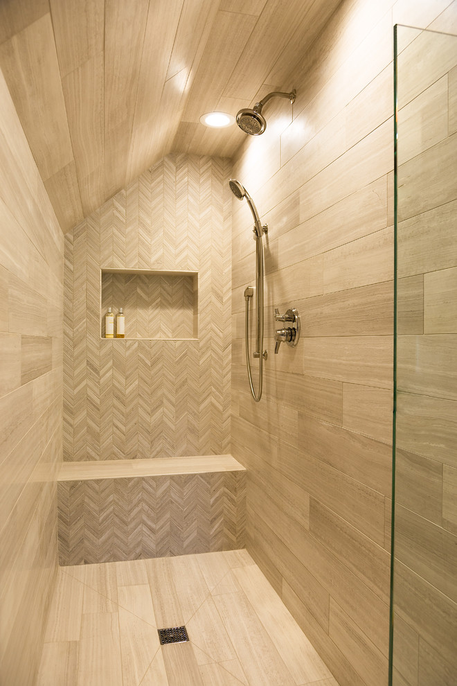 Example of a mid-sized transitional 3/4 beige tile and ceramic tile ceramic tile alcove shower design with recessed-panel cabinets, white cabinets, limestone countertops, beige walls and an undermount sink