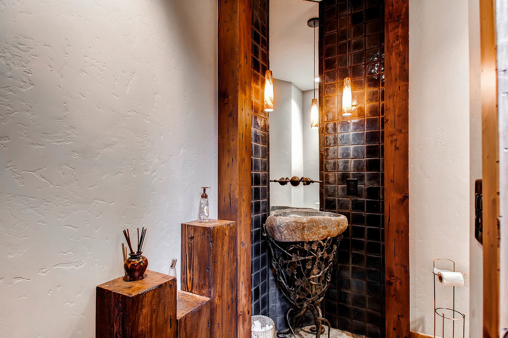 Powder room - rustic powder room idea in Denver with a pedestal sink