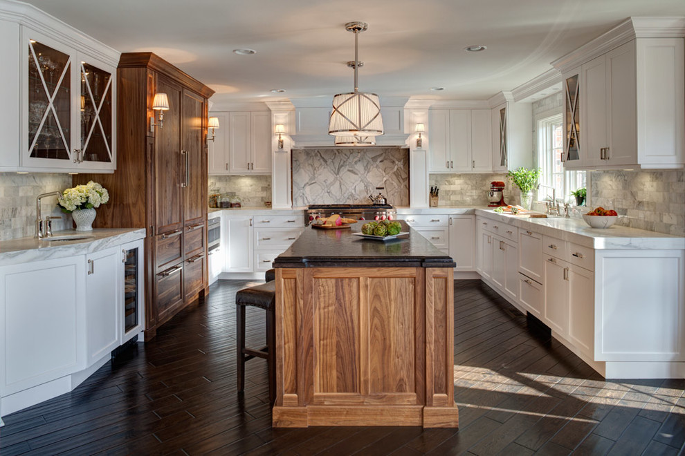 Inspiration for a transitional kitchen in Chicago with recessed-panel cabinets, white cabinets and grey splashback.