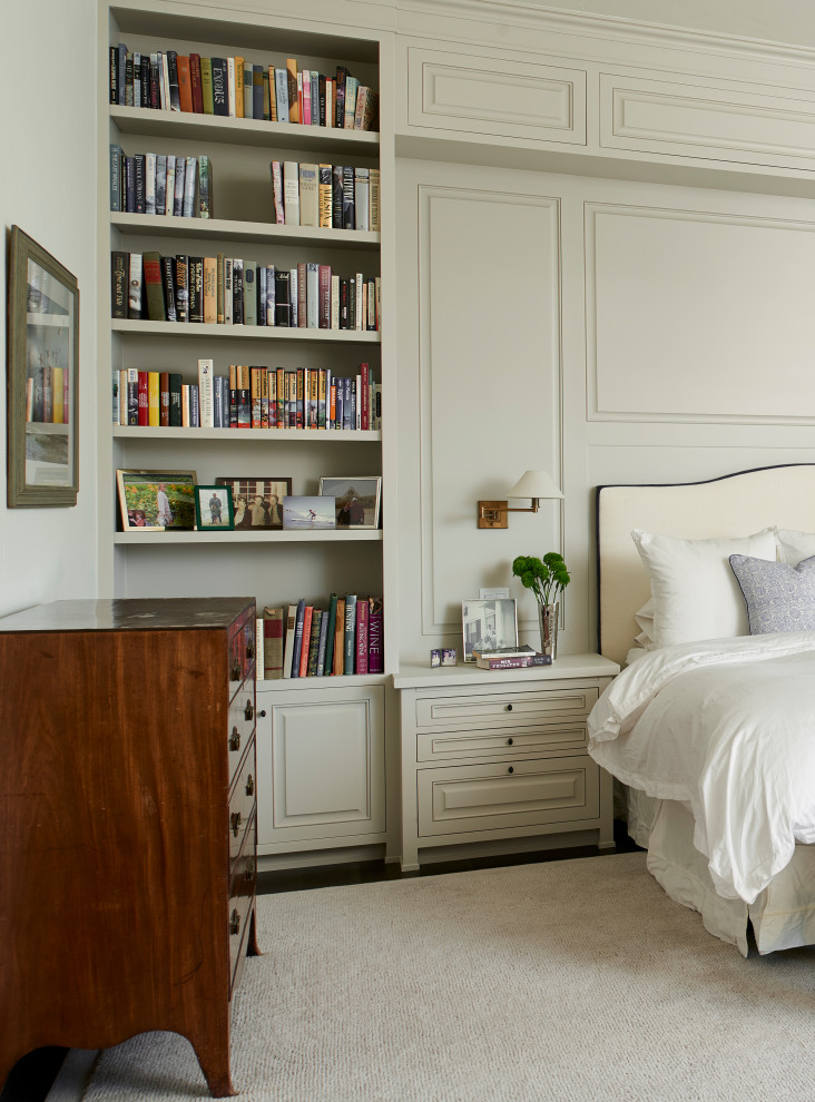 Inspiration for a transitional master bedroom in Los Angeles with beige walls, dark hardwood floors and brown floor.