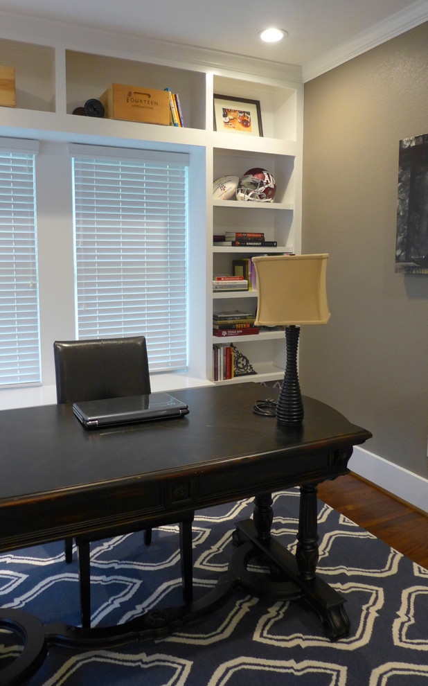 This is an example of a contemporary home office in Houston.