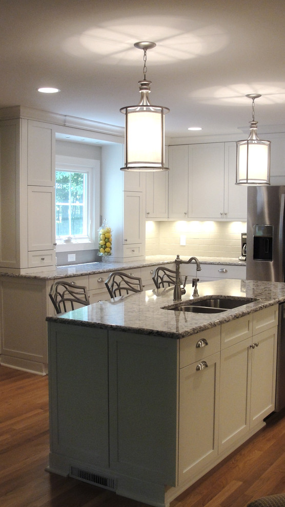 Example of a transitional kitchen design in Raleigh