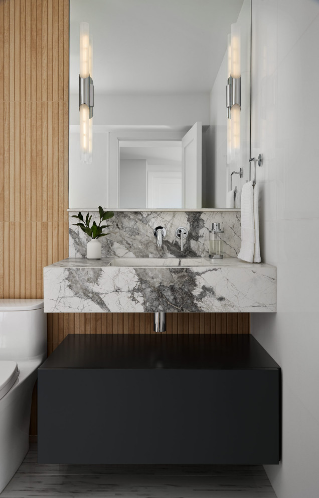 Idée de décoration pour une salle de bain nordique avec des portes de placard noires, un carrelage imitation parquet, un plan de toilette gris, meuble simple vasque et meuble-lavabo suspendu.