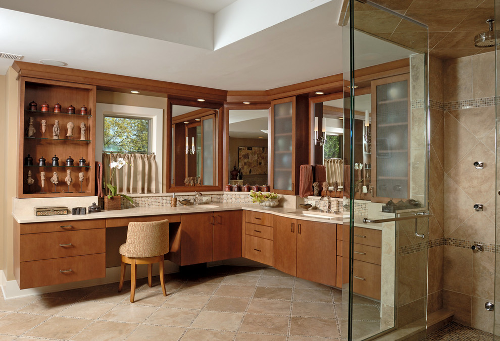 Inspiration for a large contemporary master bathroom in Chicago with flat-panel cabinets, medium wood cabinets, a corner shower, a drop-in tub, beige tile, mosaic tile, beige walls, ceramic floors, an undermount sink, granite benchtops, beige floor and a hinged shower door.