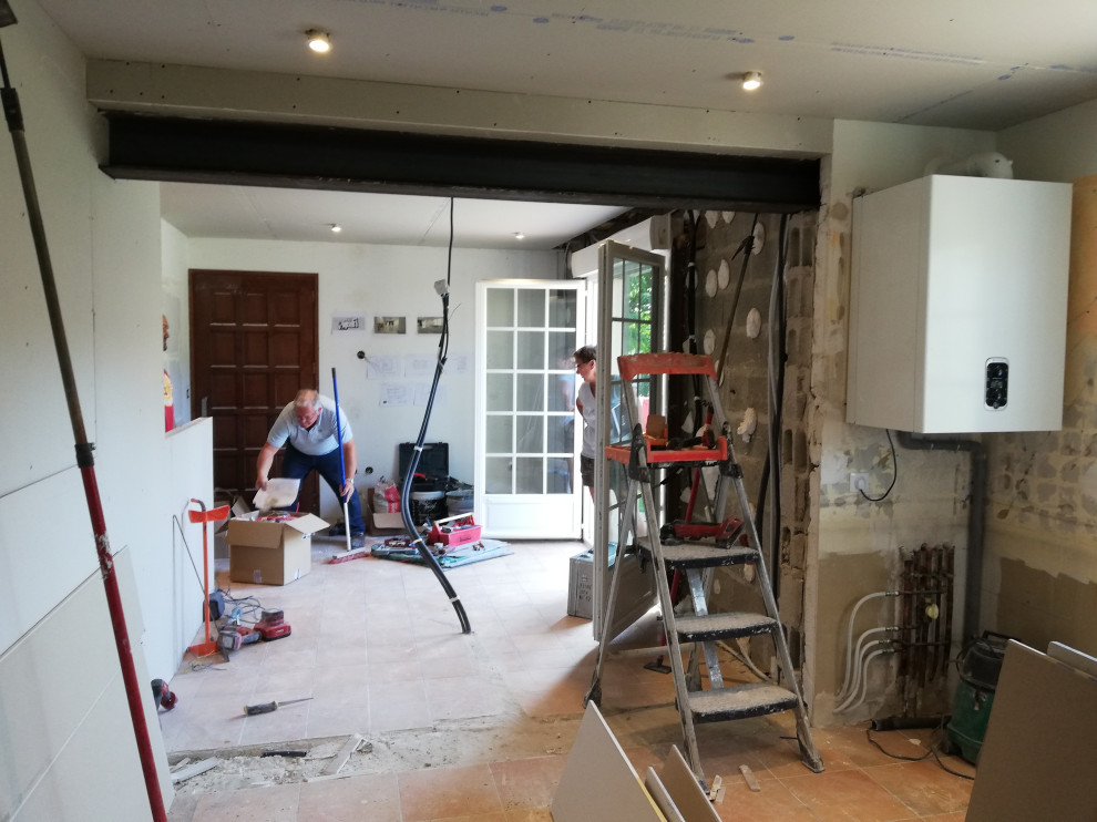 Avant/Apres Rénovation complète d'une cuisine, abattement d'un mur porteur