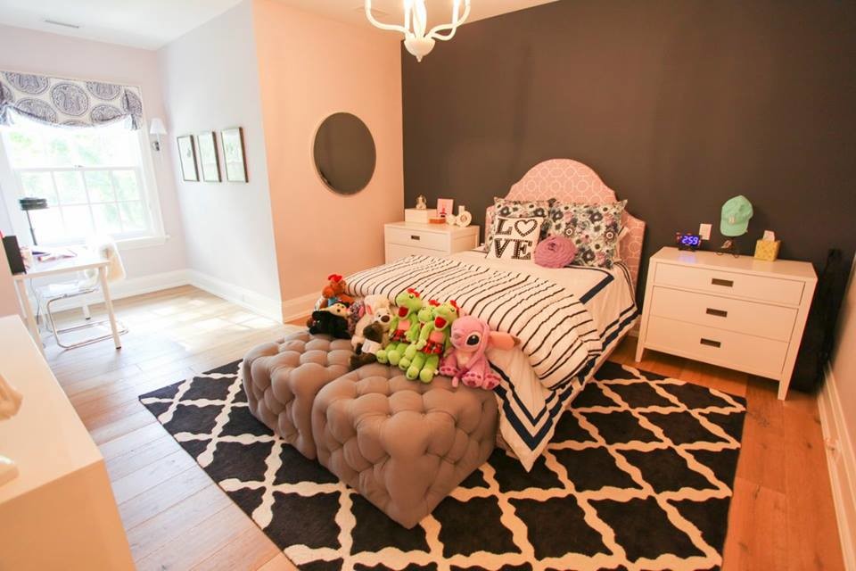 Inspiration for an expansive arts and crafts kids' bedroom for kids 4-10 years old and girls in Toronto with light hardwood floors.