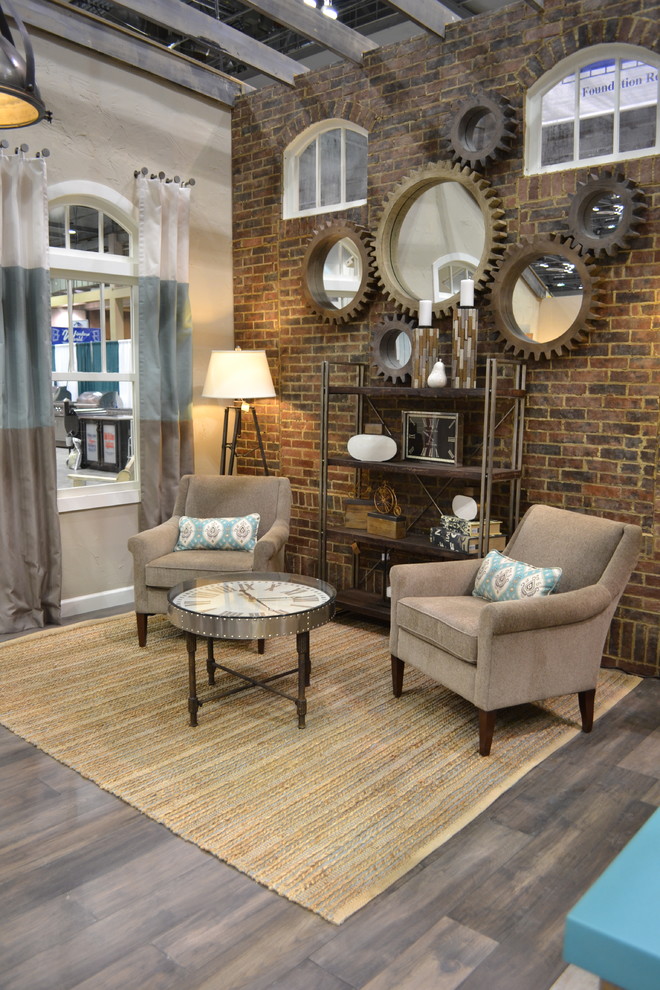 Inspiration for a mid-sized industrial open concept dark wood floor living room remodel in Other with beige walls and no fireplace