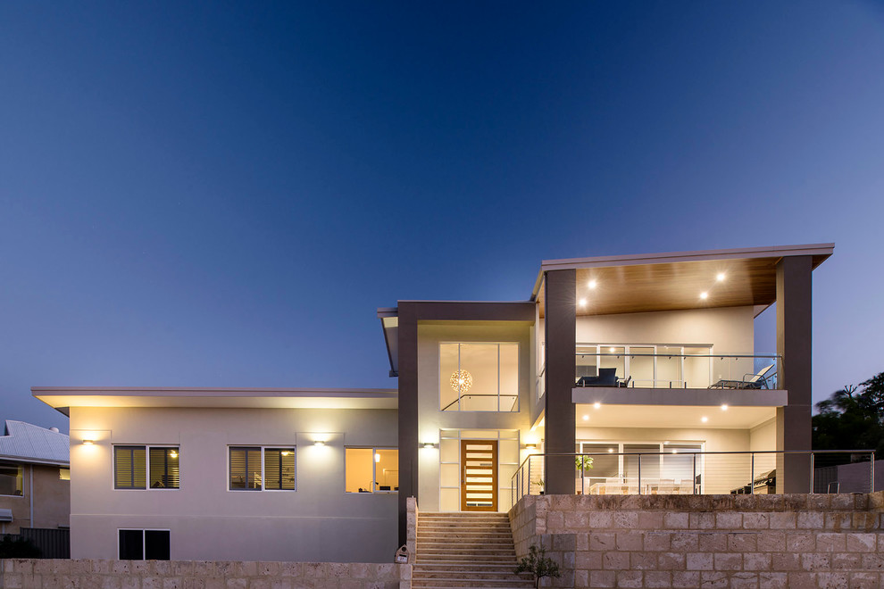 Design ideas for a mid-sized contemporary two-storey exterior in Perth.