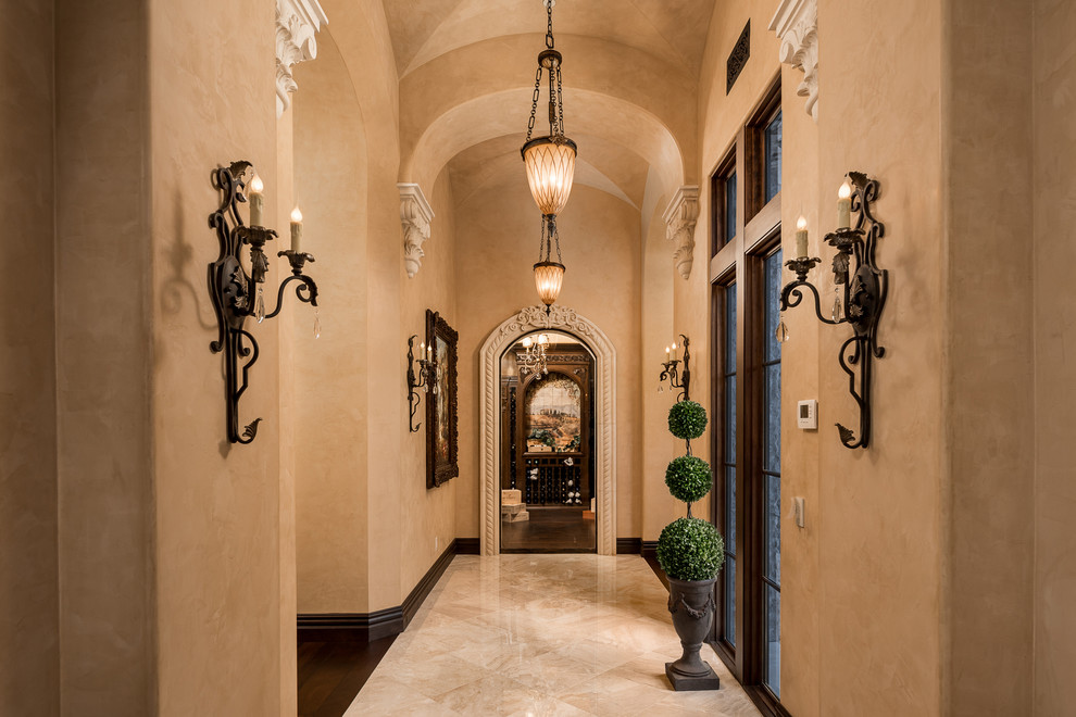 Inspiration for an expansive country hallway in Phoenix with grey walls, marble floors and multi-coloured floor.