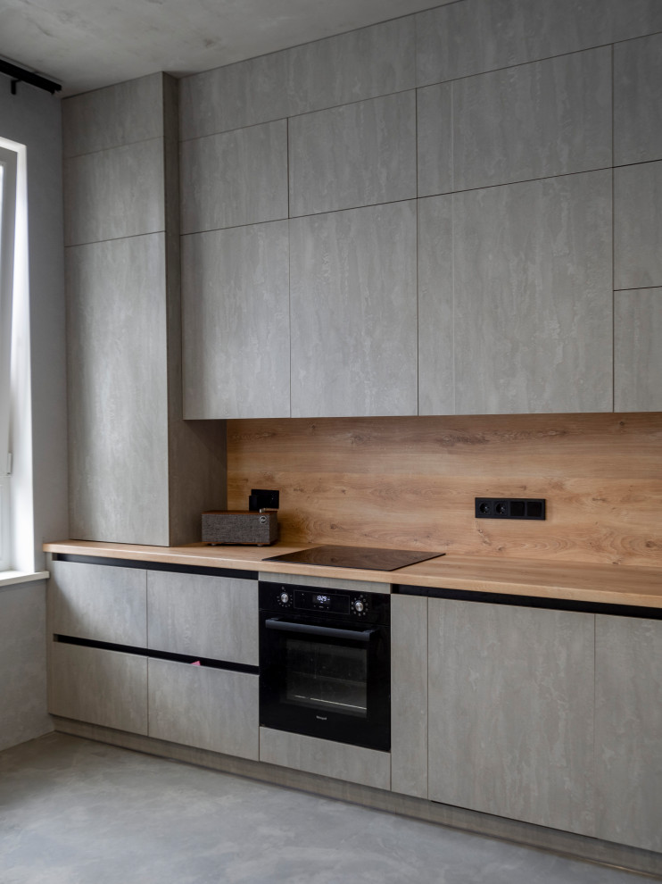 Элегантная минималистичная кухня в сером цвете