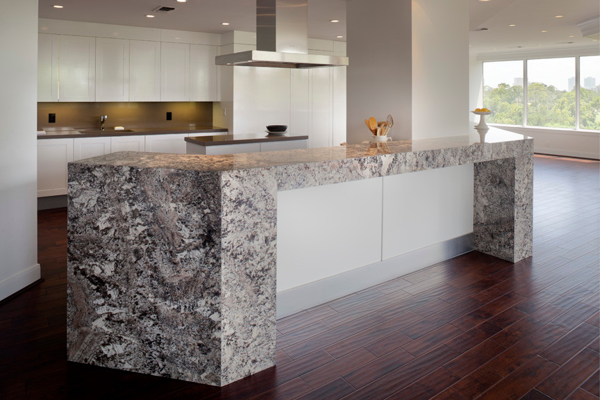 Small minimalist open concept medium tone wood floor kitchen photo in Houston with white walls and no fireplace