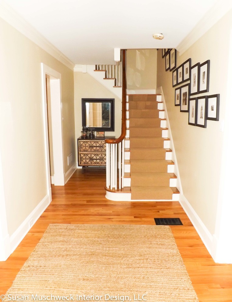 Foyer - mid-sized transitional light wood floor foyer idea with beige walls