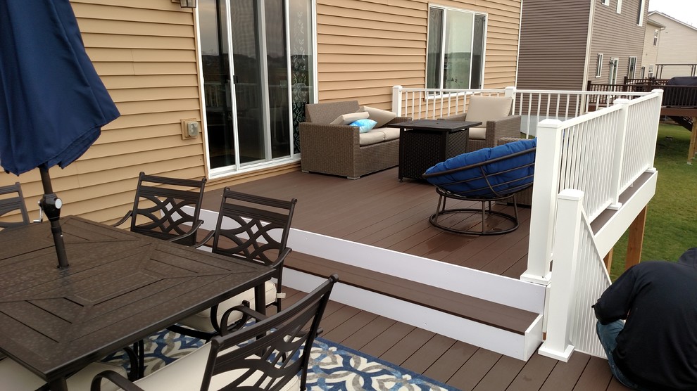 Deck - large transitional backyard deck idea in Minneapolis