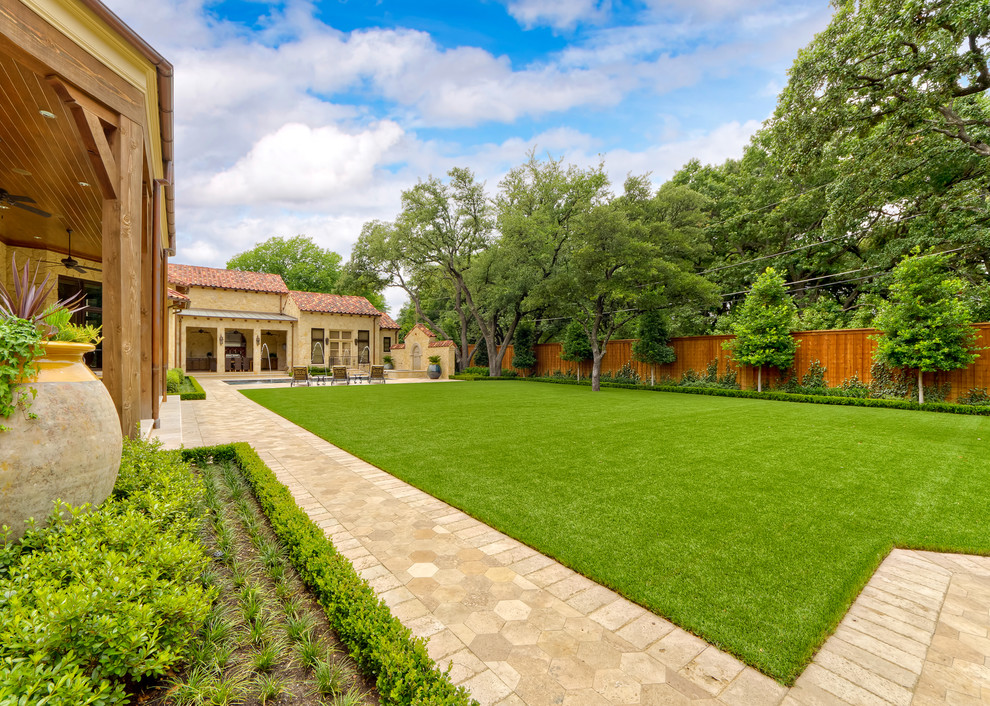 Inspiration for a mediterranean backyard garden in Dallas with with privacy feature.