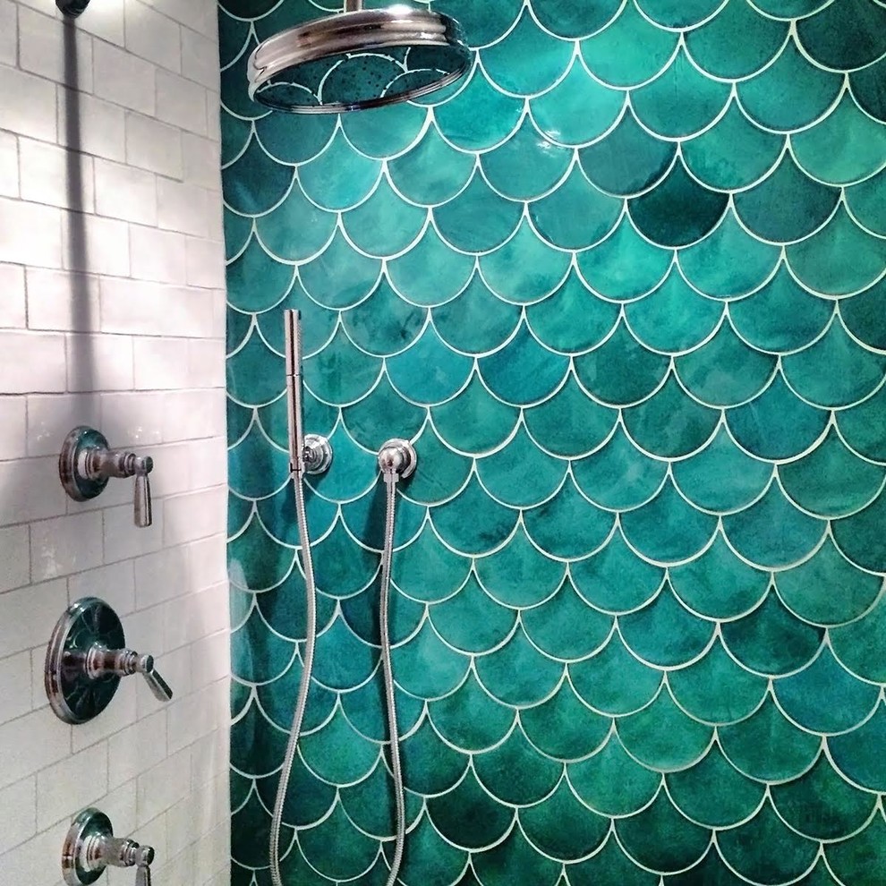 Inspiration for a mid-sized mediterranean master bathroom in Baltimore with an alcove shower, green tile, ceramic tile, white cabinets, a two-piece toilet, beige walls and marble floors.
