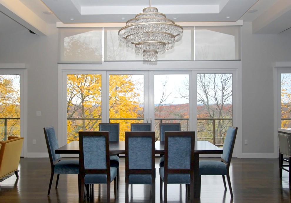 Kitchen/dining room combo - transitional dark wood floor kitchen/dining room combo idea in Boston with gray walls