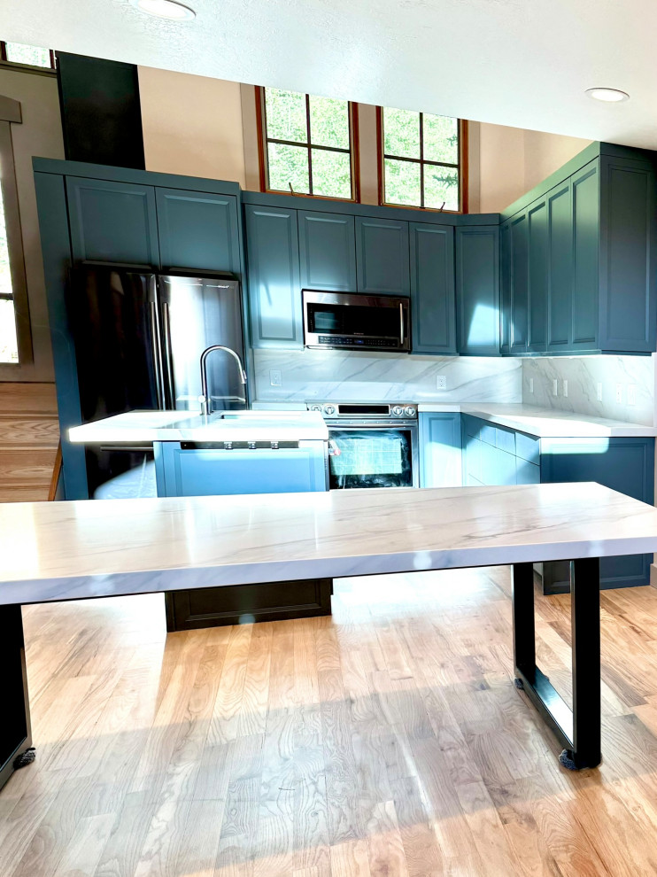 Custom kitchen cabinets, matching countertops, island, back splash, new custom t